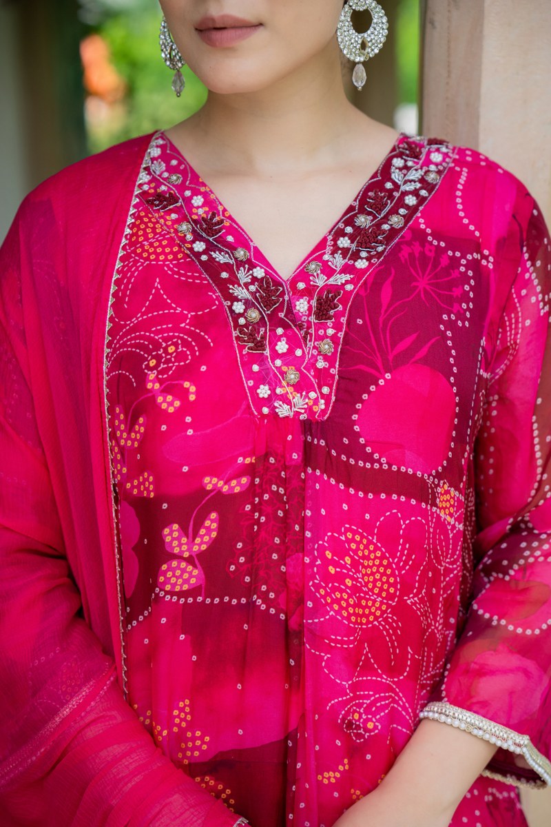 Elegant Red- Pink A-Line Kurta Set With Embroidered V-Neck And Abstract Floral Print